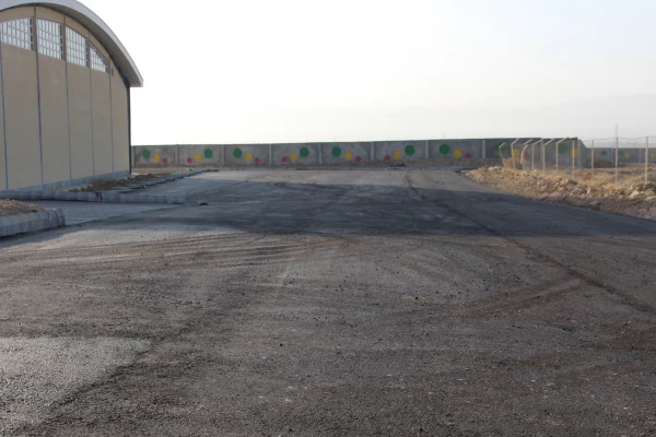 اسفالت ریزی محوطه سراهای دانشجویی و مجموعه ورزشی دانشگا هفرهنگیان خراسان شمالی 5