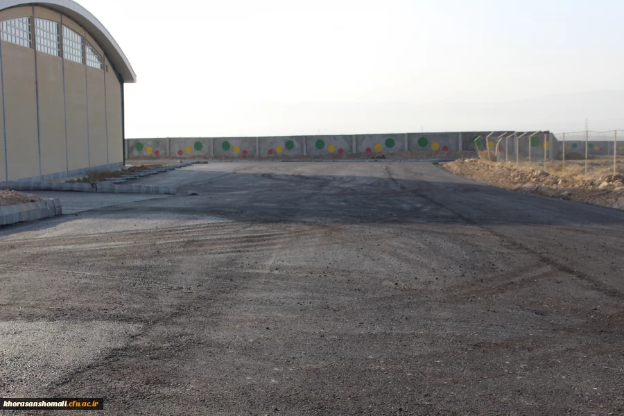 اسفالت ریزی محوطه سراهای دانشجویی و مجموعه ورزشی دانشگا هفرهنگیان خراسان شمالی 5